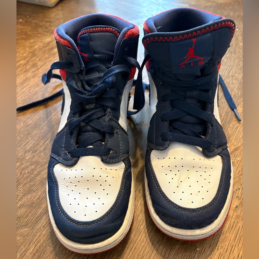 Air Jordan 1 Mid GS 'USA Olympic' sneakers with red, white, & blue accents kids